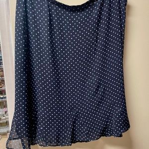 Harold’s ladies size 4 skirt - it’s navy with white dots and a zipper.